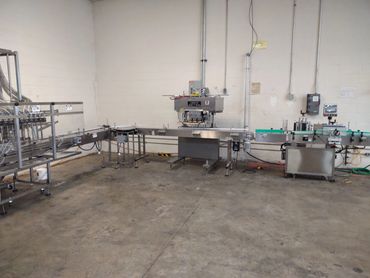 Automated filling capping line