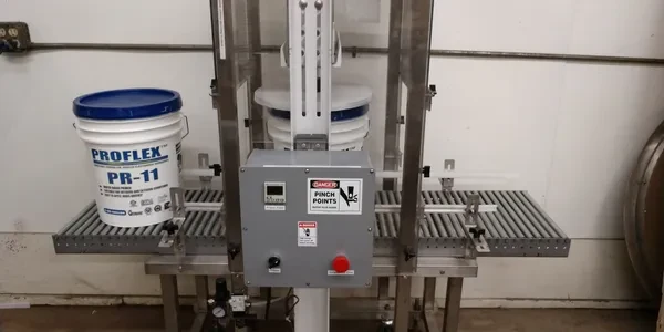 Semi-automatic lid press machine for five-gallon pails